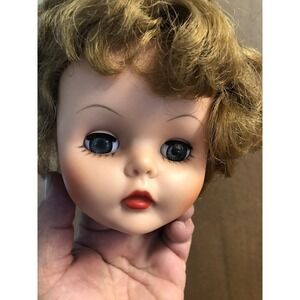 Doll Head Rubber Saucey Walker ?  I think So.